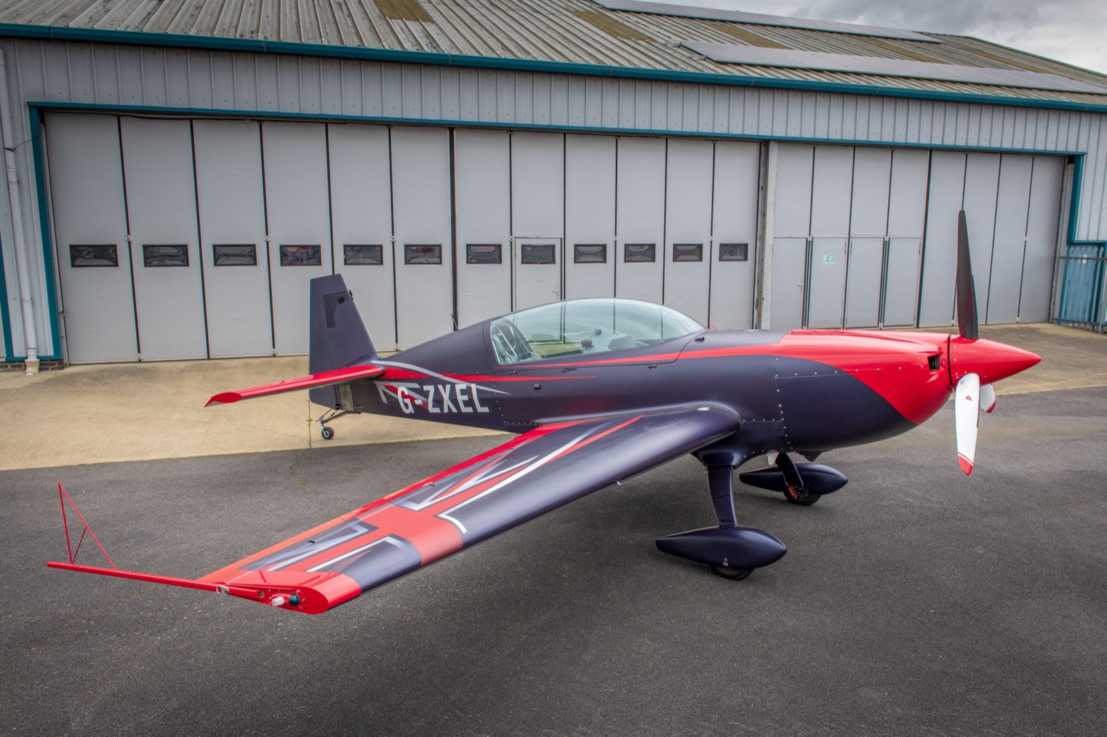 The Union Jack on the Extra 300 tail, seen across the wing